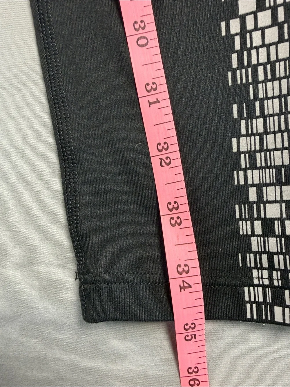 Nike Black dry fit Women’s Leggings with White Side  reflective Mosaic Print.